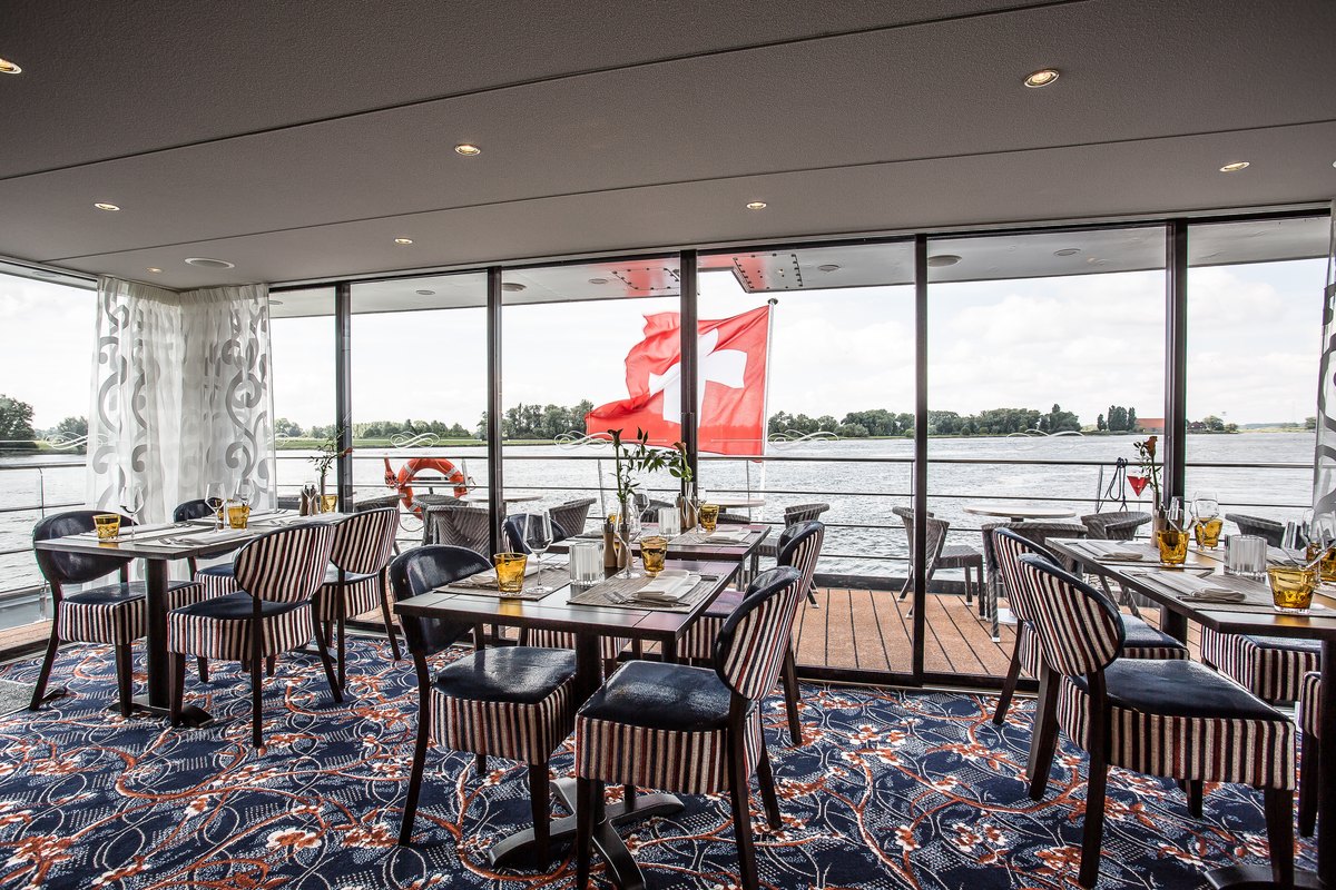 Riverside dining with panoramic windows