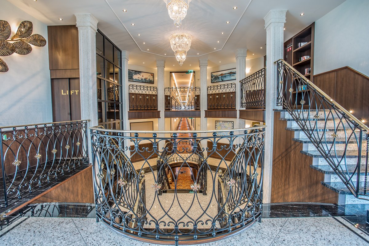 The atrium and staircase aboard the MS Oscar Wilde